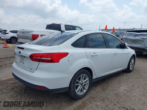 2018 Ford Focus SE z VIN 1FADP3F22JL292697, wystawiony jako IAAI lot #42094271 z przebiegiem 43 614 mil mil oraz . Historia ofert i sprzedaży dostępna na DreamBid. Obrazek 4.
