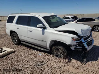 2018 Chevrolet Tahoe LS with VIN 1GNSKAKC6JR258527, listed as a Copart auction lot 71314804 with 69,040 mi miles and Salvage Title. Bid and sale history available at carsss.com. Image 4.