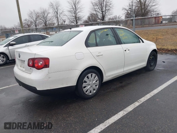 2009 Volkswagen Jetta S z VIN 3VWJZ71K49M129501, wystawiony jako IAAI lot #41461767 z przebiegiem 250 552 mil mil oraz . Historia ofert i sprzedaży dostępna na DreamBid. Obrazek 4.