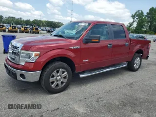 2014 Ford F-150 XL with VIN 1FTFW1CT7EKG41338, listed as a Copart auction lot 60037405 with 128,130 mi miles and Salvage title. Bid and sale history available at DreamBid. Image 1.