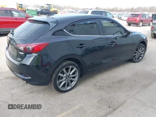 2018 Mazda 3 Touring with VIN 3MZBN1L30JM247097, listed as a IAAI auction lot 41803062 with 61,345 mi miles. Bid and sale history available at carsss.com. Image 4.