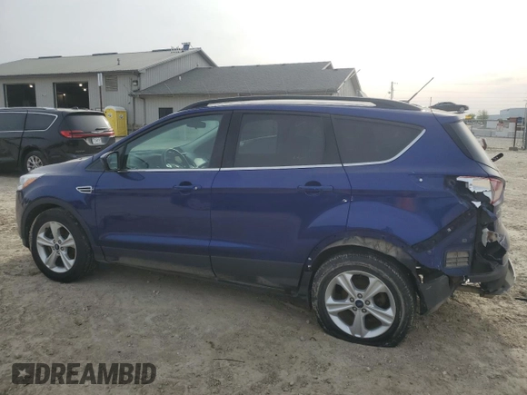 2015 Ford Escape SE with VIN 1FMCU0GX3FUB59712, listed as a Copart auction lot 53817045 with 100,580 mi miles and Salvage Title. Bid and sale history available at DreamBid. Image 2.