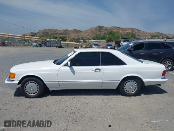 1991 Mercedes-Benz 560 with VIN WDBCA45E7MA610580, listed as a IAAI auction lot 42099161 with 83,344 mi miles and . Bid and sale history available at DreamBid. Image 14.