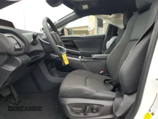 2024 Toyota bZ4X XLE with VIN JTMABACA2RA087660, listed as a Copart auction lot 61295995 with 2,288 mi miles and Salvage title. Bid and sale history available at DreamBid. Image 7.
