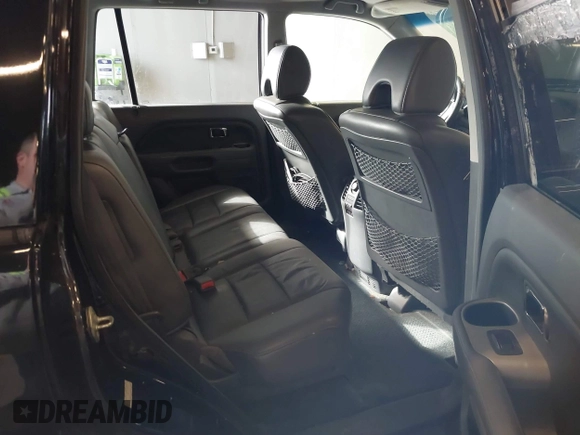 2007 Honda Pilot EX-L with VIN 2HKYF18647H504953, listed as a IAAI auction lot 41750435 with 186,097 mi miles and . Bid and sale history available at DreamBid. Image 8.