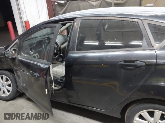2013 Ford Fiesta SE with VIN 3FADP4EJ1DM107945, listed as a IAAI auction lot 42025064 with Not Provided miles and . Bid and sale history available at DreamBid. Image 13.
