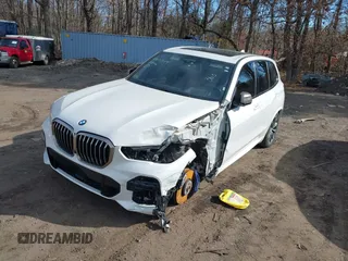 2020 BMW X5 M50i with VIN 5UXJU4C06LLE45651, listed as a IAAI auction lot 41618355 with 70,885 mi miles and . Bid and sale history available at DreamBid. Image 6.