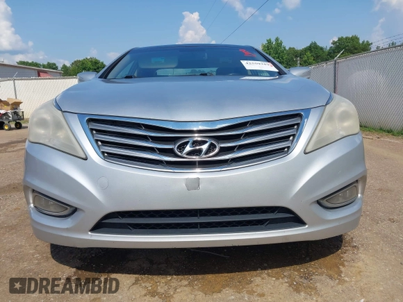 2012 Hyundai Azera z VIN KMHFH4JGXCA182208, wystawiony jako IAAI lot #42559319 z przebiegiem 236 086 mil mil oraz . Historia ofert i sprzedaży dostępna na DreamBid. Obrazek 19.