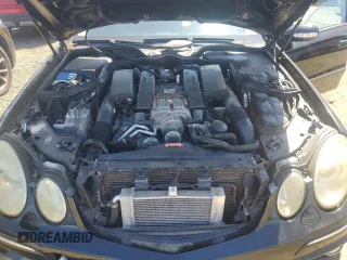2005 Mercedes-Benz E-Class 5.5L AMG with VIN WDBUF76J85A775915, listed as a Copart auction lot 69093134 with 125,841 mi miles and Clean Title. Bid and sale history available at carsss.com. Image 11.