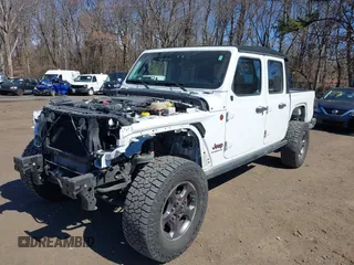 2020 Jeep Gladiator Rubicon with VIN 1C6JJTBG1LL181875, listed as a IAAI auction lot 41722037 with 51,037 mi miles and . Bid and sale history available at DreamBid. Image 6.