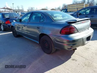 2004 Pontiac Grand Am SE with VIN 1G2NE52F54M560234, listed as a IAAI auction lot 41716361 with 256,571 mi miles. Bid and sale history available at carsss.com. Image 3.