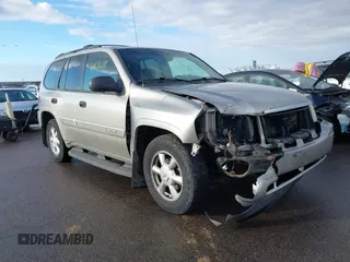 2003 GMC Envoy SLT with VIN 1GKDT13S532308502, listed as a IAAI auction lot 41676188 with 218,626 mi miles. Bid and sale history available at carsss.com. Image 6.