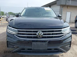 2023 Volkswagen Tiguan SE with VIN 3VVMB7AXXPM003447, listed as a IAAI auction lot 42566061 with 39,185 mi miles and . Bid and sale history available at DreamBid. Image 12.
