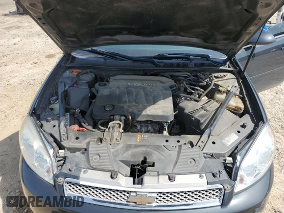 2014 Chevrolet Impala LS with VIN 2G1WA5E31E1171237, listed as a Copart auction lot 61774405 with 141,838 mi miles and Salvage title. Bid and sale history available at DreamBid. Image 11.