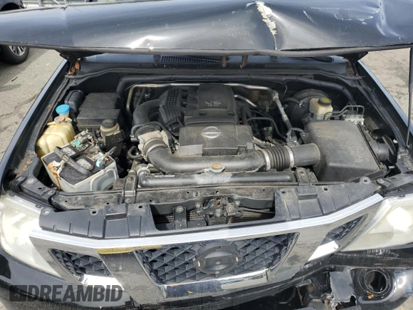 2015 Nissan Frontier SV z VIN 1N6AD0CW3FN700094, wystawiony jako Copart lot #48977695 z przebiegiem 121 415 mil mil oraz Szkoda całkowita • Salvage title. Historia ofert i sprzedaży dostępna na DreamBid. Obrazek 11.