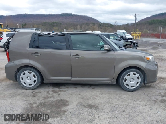 2014 Scion xB with VIN JTLZE4FE9EJ050596, listed as a IAAI auction lot 41884572 with 141,896 mi miles. Bid and sale history available at carsss.com. Image 13.