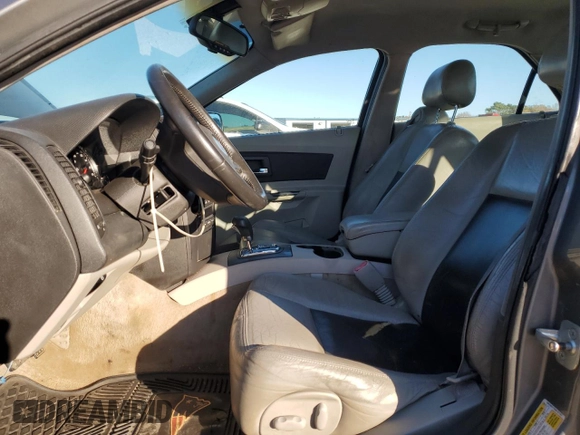 2006 Cadillac CTS with VIN 1G6DM57T860127187, listed as a Copart auction lot 83370944 with 233,004 mi miles and Salvage Title. Bid and sale history available at DreamBid. Image 7.