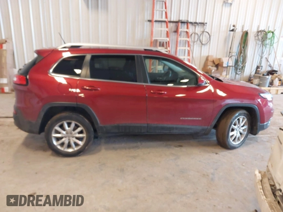 2014 Jeep Cherokee Limited z VIN 1C4PJMDB5EW237604, wystawiony jako IAAI lot #41694117 z przebiegiem 95 959 mil mil oraz . Historia ofert i sprzedaży dostępna na DreamBid. Obrazek 13.