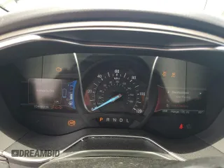 2017 Ford Fusion Hybrid SE z VIN 3FA6P0LU6HR319103, wystawiony jako Copart lot #58494695 z przebiegiem 104 483 mil mil oraz Szkoda całkowita • Salvage title. Historia ofert i sprzedaży dostępna na DreamBid. Obrazek 9.
