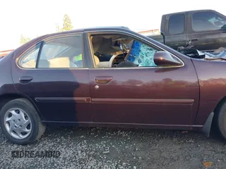 1999 Nissan Altima XE with VIN 1N4DL01D7XC147120, listed as a IAAI auction lot 41467346 with Not Provided miles and . Bid and sale history available at carsss.com. Image 12.