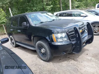 2014 Chevrolet Tahoe Commercial z VIN 1GNSK2E07ER188713, wystawiony jako IAAI lot #42749126 z przebiegiem Nie podano mil oraz . Historia ofert i sprzedaży dostępna na DreamBid. Obrazek 1.