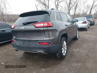 2014 Jeep Cherokee Limited with VIN 1C4PJMDS3EW137985, listed as a IAAI auction lot 41543651 with 131,312 mi miles. Bid and sale history available at carsss.com. Image 4.