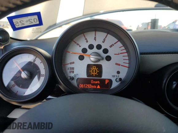 2014 MINI Convertible S with VIN WMWZP3C58ET706941, listed as a Copart auction lot 81900674 with 61,292 mi miles and Salvage title. Bid and sale history available at DreamBid. Image 9.