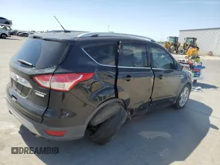 2015 Ford Escape Titanium with VIN 1FMCU0J97FUC80446, listed as a Copart auction lot 58749895 with 106,890 mi miles and Salvage title. Bid and sale history available at DreamBid. Image 3.