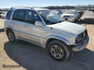 2005 Suzuki Grand Vitara LX with VIN JS3TD62V054100520, listed as a Copart auction lot 47001355 with 154,181 mi miles and Salvage Title. Bid and sale history available at carsss.com. Image 4.