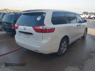 2015 Toyota Sienna L with VIN 5TDZK3DC5FS657115, listed as a IAAI auction lot 42109678 with 176,995 mi miles. Bid and sale history available at carsss.com. Image 4.