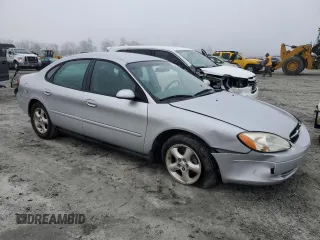 2000 Ford Taurus SE with VIN 1FAFP53U6YA132385, listed as a Copart auction lot 87256354 with 160,109 mi miles and Salvage Title. Bid and sale history available at DreamBid. Image 4.