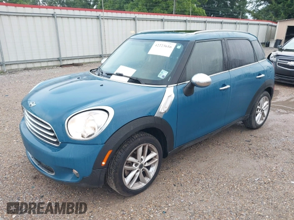 2012 MINI Countryman with VIN WMWZB3C56CWM06101, listed as a IAAI auction lot 42223616 with 149,680 mi miles and . Bid and sale history available at DreamBid. Image 2.
