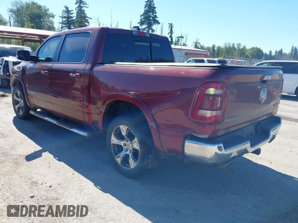 2019 Ram 1500 Laramie with VIN 1C6SRFJT2KN677400, listed as a IAAI auction lot 42441010 with 76,750 mi miles and . Bid and sale history available at DreamBid. Image 3.