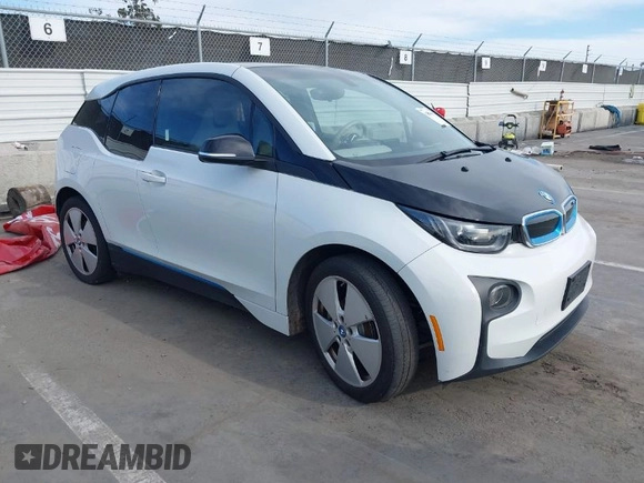 2015 BMW i3 z VIN WBY1Z2C51FV286626, wystawiony jako IAAI lot #41948522 z przebiegiem 106 060 mil mil oraz . Historia ofert i sprzedaży dostępna na DreamBid. Obrazek 1.