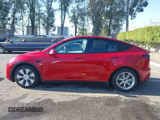 2020 Tesla Model Y Long Range with VIN 5YJYGDEE8LF057014, listed as a IAAI auction lot 41988113 with 18,246 mi miles and . Bid and sale history available at DreamBid. Image 15.