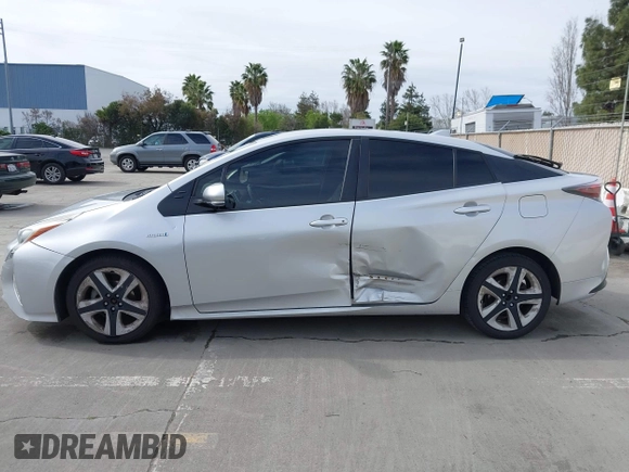 2016 Toyota Prius Four with VIN JTDKARFU9G3008336, listed as a IAAI auction lot 41710594 with 224,479 mi miles and . Bid and sale history available at DreamBid. Image 14.