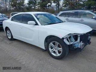 2015 Dodge Charger SE with VIN 2C3CDXBGXFH874160, listed as a IAAI auction lot 41898068 with 129,465 mi miles. Bid and sale history available at carsss.com. Image 1.