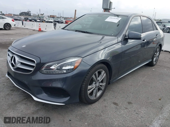 2014 Mercedes-Benz E-Class E 250 BlueTEC Luxury with VIN WDDHF0EB6EA942847, listed as a IAAI auction lot 41631294 with 48,650 mi miles. Bid and sale history available at carsss.com. Image 2.
