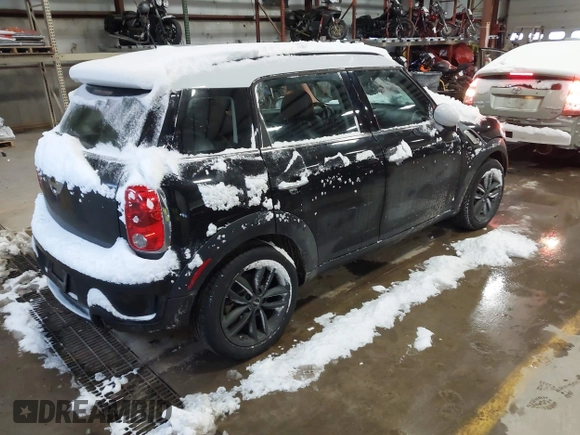 2014 MINI Countryman S with VIN WMWZC5C57EWP39161, listed as a IAAI auction lot 41342912 with 108,459 mi miles and . Bid and sale history available at DreamBid. Image 4.