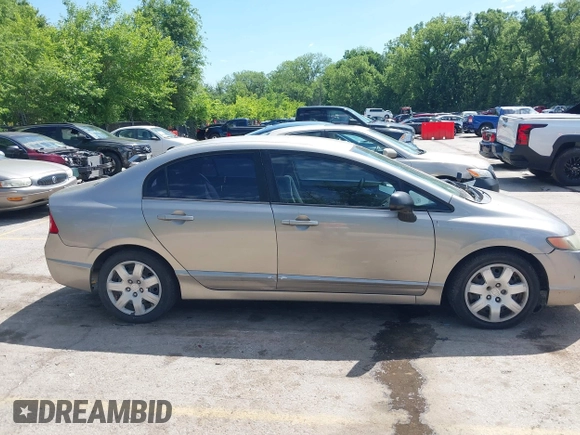 2006 Honda Civic LX z VIN 1HGFA16586L083119, wystawiony jako IAAI lot #42237313 z przebiegiem Nie podano mil oraz . Historia ofert i sprzedaży dostępna na DreamBid. Obrazek 14.