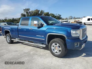 2017 GMC Sierra 3500HD Denali z VIN 1GT42YEY6HF158831, wystawiony jako Copart lot #74659734 z przebiegiem Nie podano mil oraz Nie do naprawy • Non repairable. Historia ofert i sprzedaży dostępna na DreamBid. Obrazek 4.