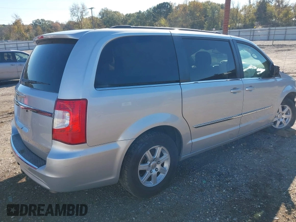 2012 Chrysler Town & Country Touring with VIN 2C4RC1BGXCR338160, listed as a IAAI auction lot 41042918 with 214,961 mi miles and . Bid and sale history available at DreamBid. Image 4.