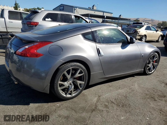 2013 Nissan 370Z with VIN JN1AZ4EH0DM380409, listed as a Copart auction lot 66869114 with 0 mi miles and Salvage Title. Bid and sale history available at carsss.com. Image 3.