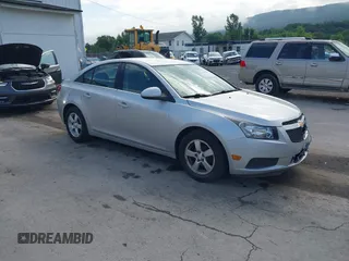 2014 Chevrolet Cruze 1LT with VIN 1G1PC5SB5E7159900, listed as a IAAI auction lot 42699928 with 124,724 mi miles and . Bid and sale history available at DreamBid. Image 1.