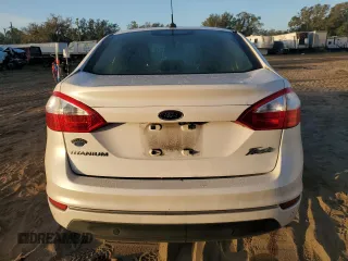 2017 Ford Fiesta Titanium with VIN 3FADP4CJ1HM123863, listed as a Copart auction lot 80270774 with 66,911 mi miles and Salvage Title. Bid and sale history available at DreamBid. Image 6.