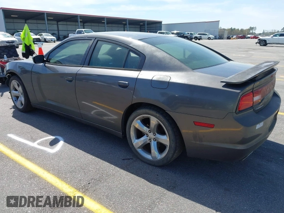 2014 Dodge Charger SE with VIN 2C3CDXBG0EH216023, listed as a IAAI auction lot 41827307 with 243,107 mi miles. Bid and sale history available at carsss.com. Image 3.