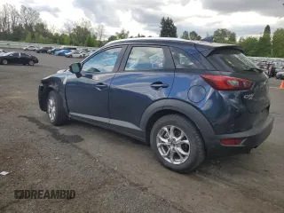 2018 Mazda CX-3 Sport z VIN JM1DKFB79J1323497, wystawiony jako Copart lot #56168875 z przebiegiem 60 284 mil mil oraz Szkoda całkowita • Salvage title. Historia ofert i sprzedaży dostępna na DreamBid. Obrazek 2.