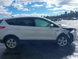 2014 Ford Escape SE with VIN 1FMCU9GX7EUD76778, listed as a IAAI auction lot 41679482 with 136,832 mi miles and . Bid and sale history available at carsss.com. Image 14.