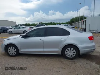 2015 Volkswagen Jetta S with VIN 3VW2K7AJ2FM312911, listed as a IAAI auction lot 42570728 with 94,385 mi miles and . Bid and sale history available at DreamBid. Image 14.