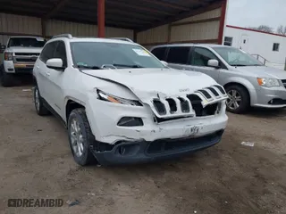 2015 Jeep Cherokee Latitude with VIN 1C4PJLCB5FW737467, listed as a IAAI auction lot 41125508 with 132,463 mi miles. Bid and sale history available at carsss.com. Image 6.